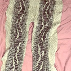 Snake print leggings.